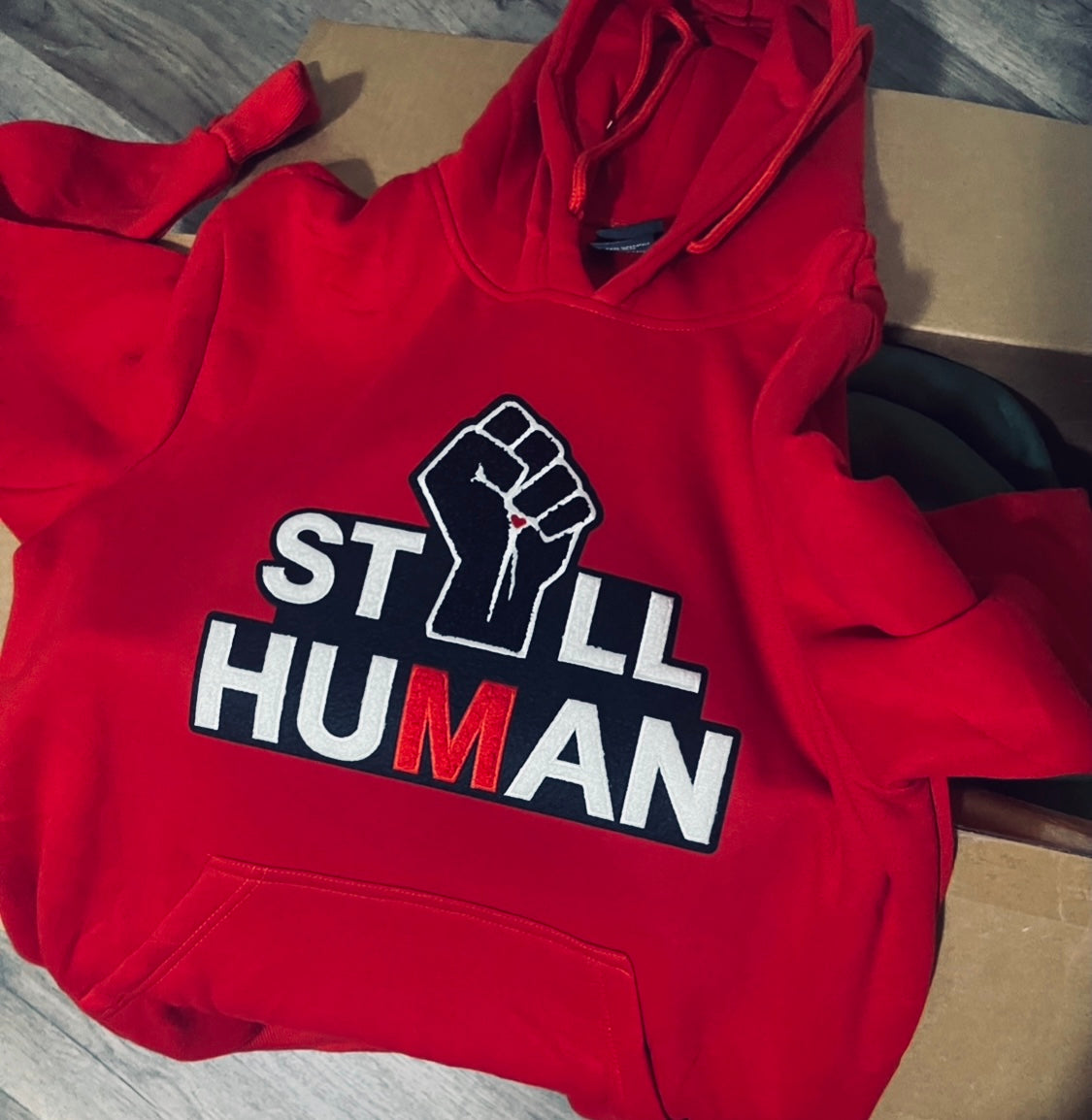 RED I’M STILL HUMAN HOODIE